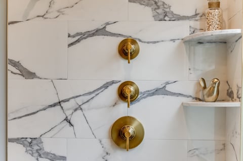 Modern elegant bathroom with walk-in shower and premium fixtures
